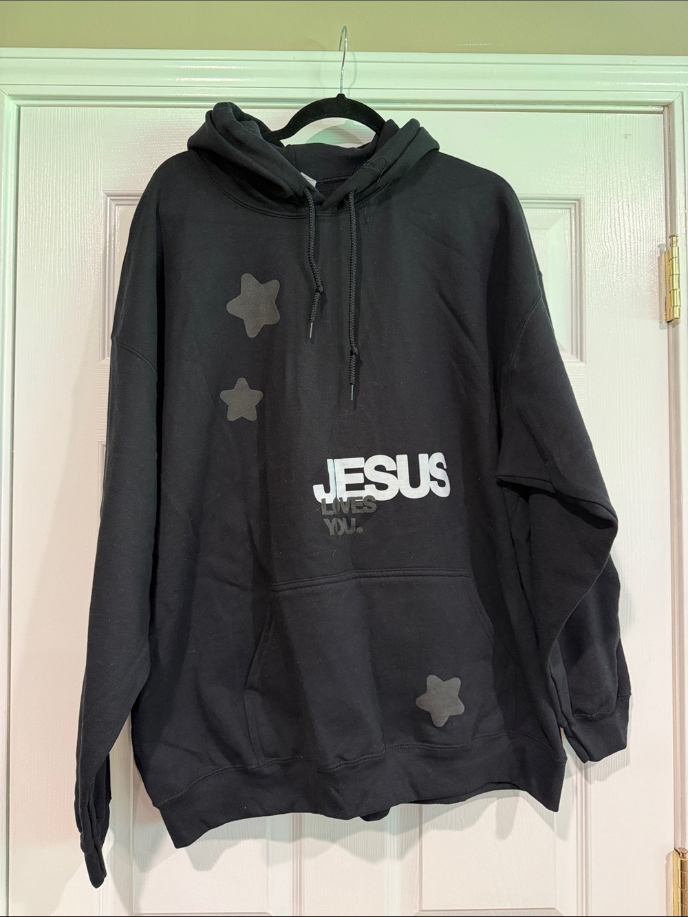 Black Crewneck Hoodie with JESUS loves you.